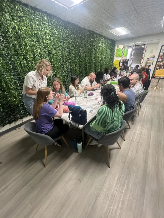 Members crocheting together at DFW Young & Social Club