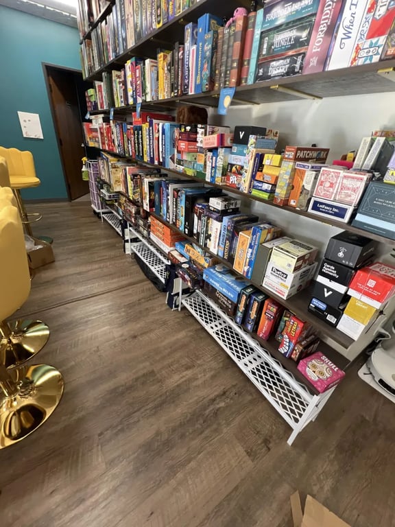 The DFWYAS board game wall.