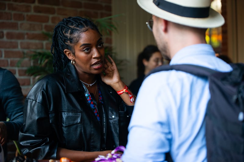 Attendees in conversation between sessions.