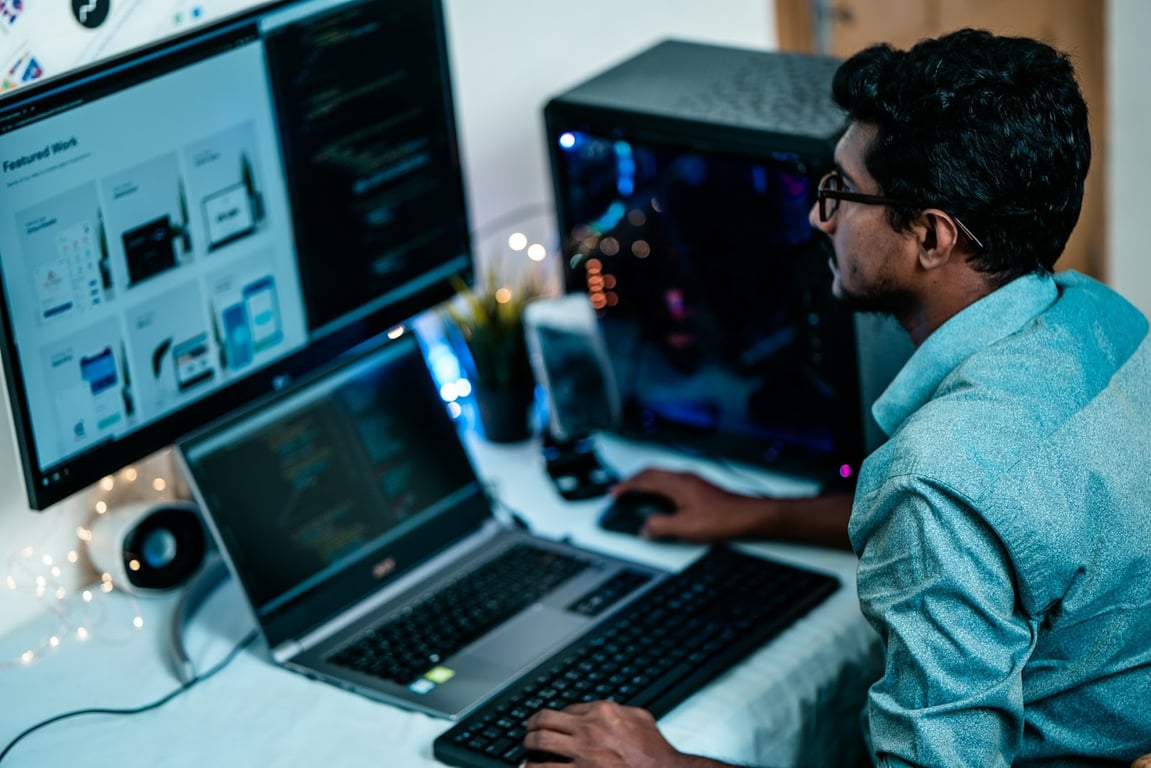 A tech talent at work on their PC