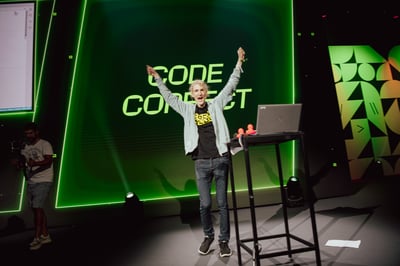 Happy winner celebrating a Code100 coding challenge victory.