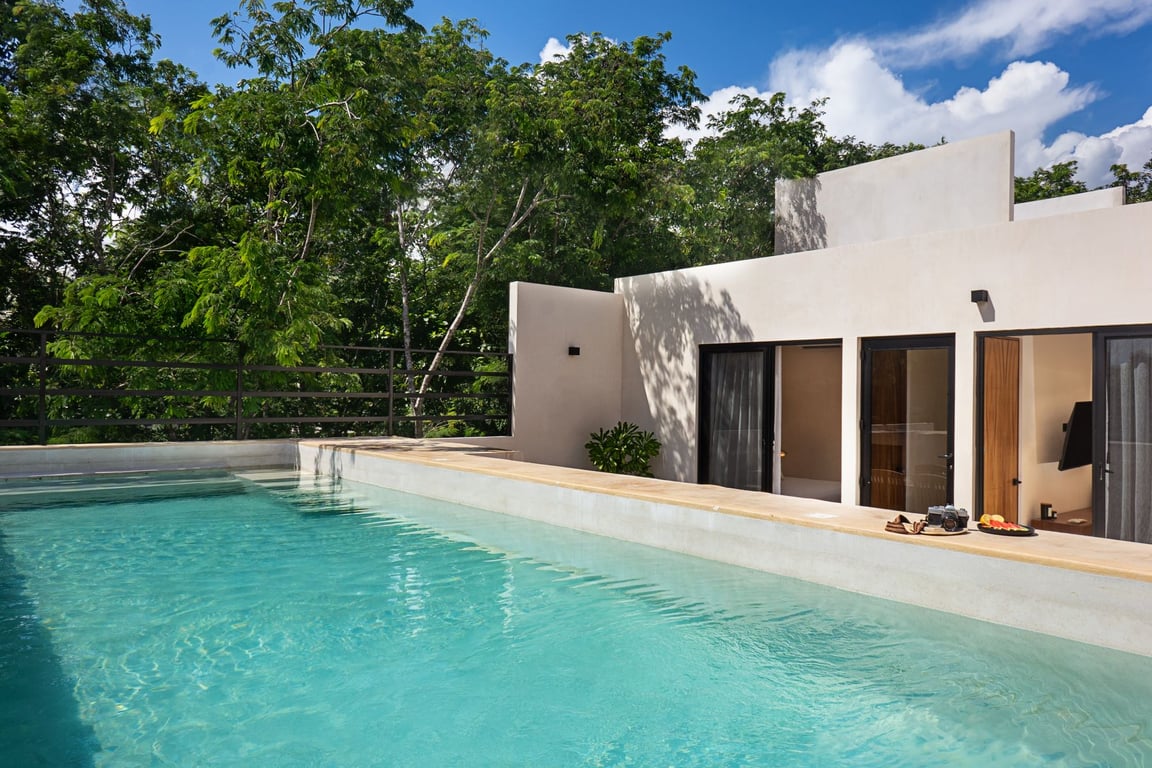 Riviera Tulum Sanctuary: Modern Four-Bedroom Haven with Rooftop Pool