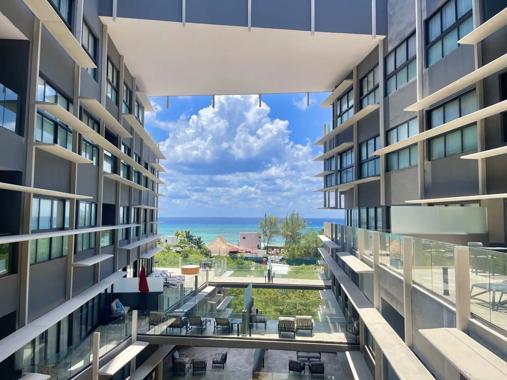 Caribbean Sea Views from a Turnkey Two-Bedroom in Downtown Playa del Carmen