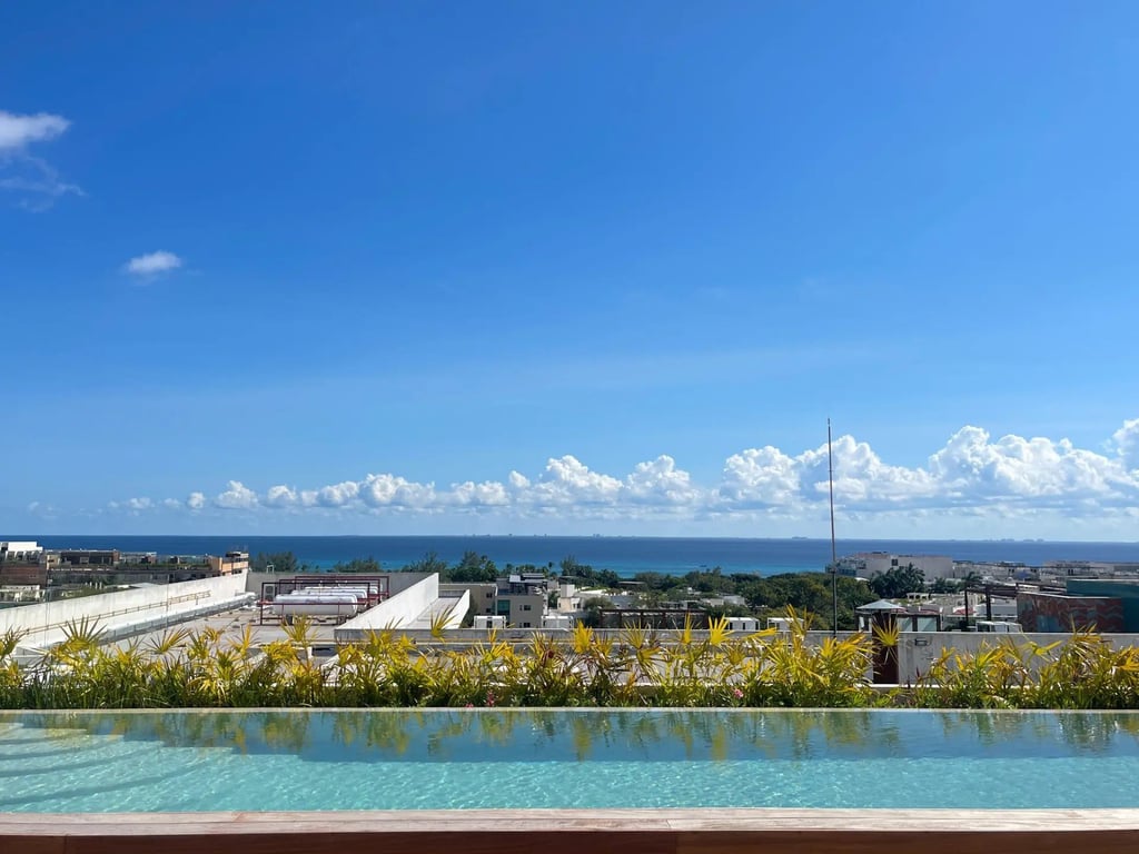 Turnkey Two-Bedroom Condo with Rooftop Pool in Downtown Playa del Carmen