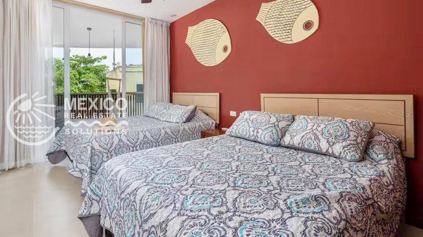 Sunlit Corner Condo with Terrace Steps from 5th Avenue in Playa del Carmen