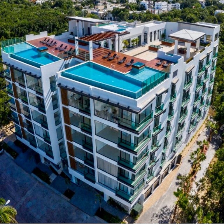 Jungle-View Retreat with Rooftop Infinity Pools in Playa del Carmen