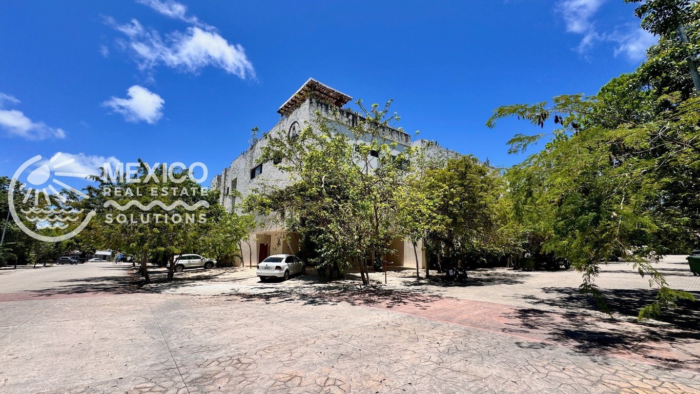 Tikal Aldea Zama Corner Ground-Floor Condo with Private Garden