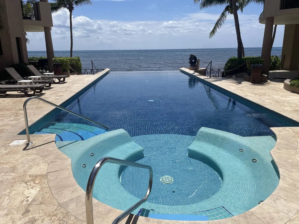 Luna Encantada A1: Turn-Key Beachfront Condo on Playa del Carmen's Sand