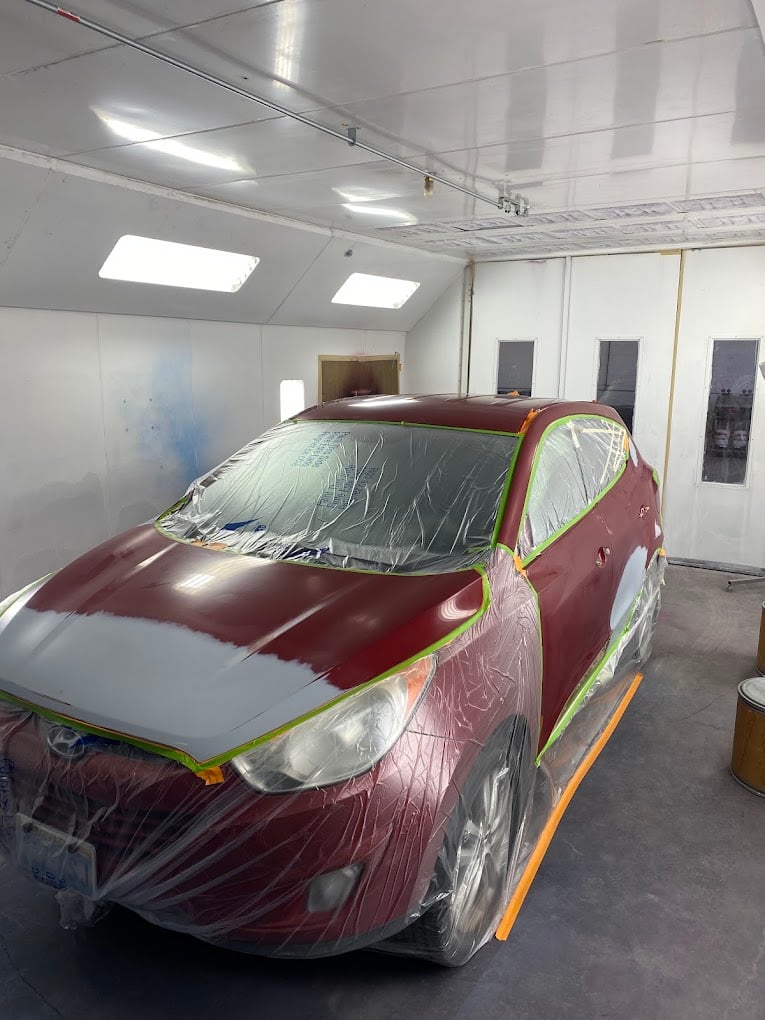 Car Being Painted In Shop at Carson Auto Body