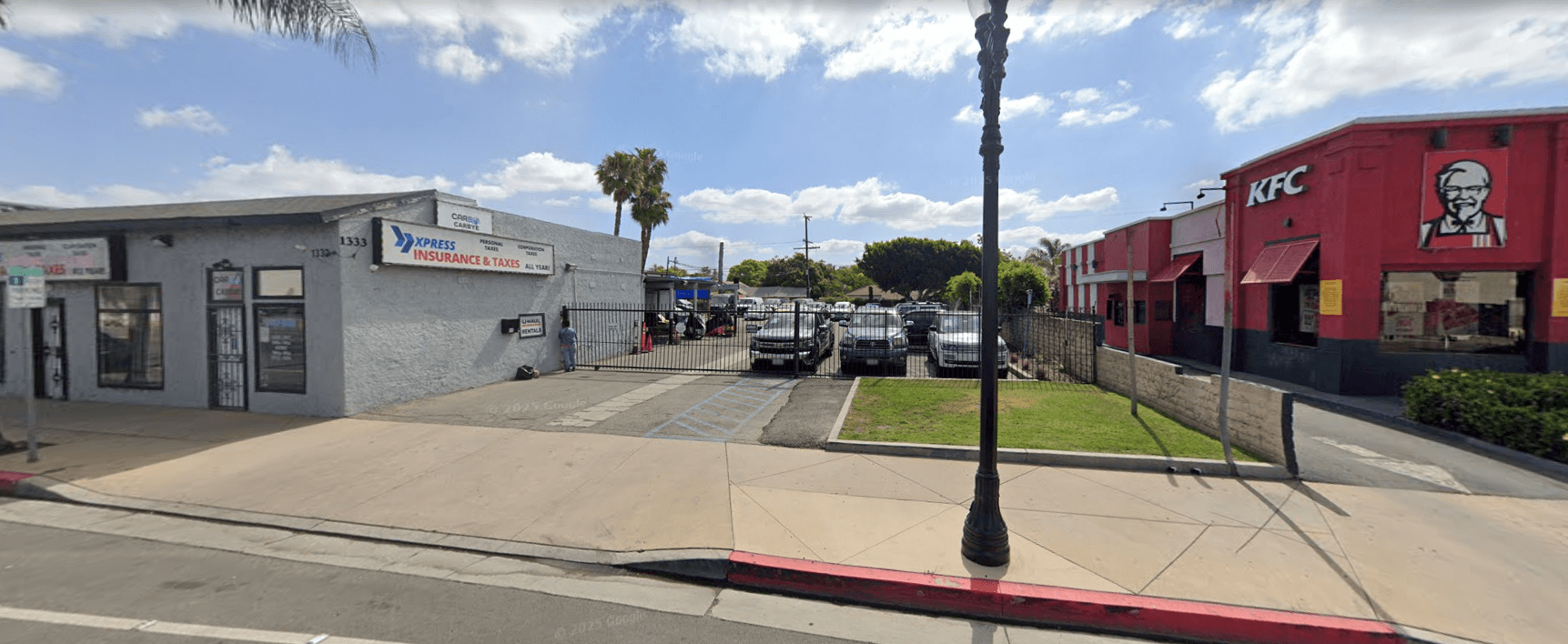 Entrance to Xclusive Tire Inc on Main Street