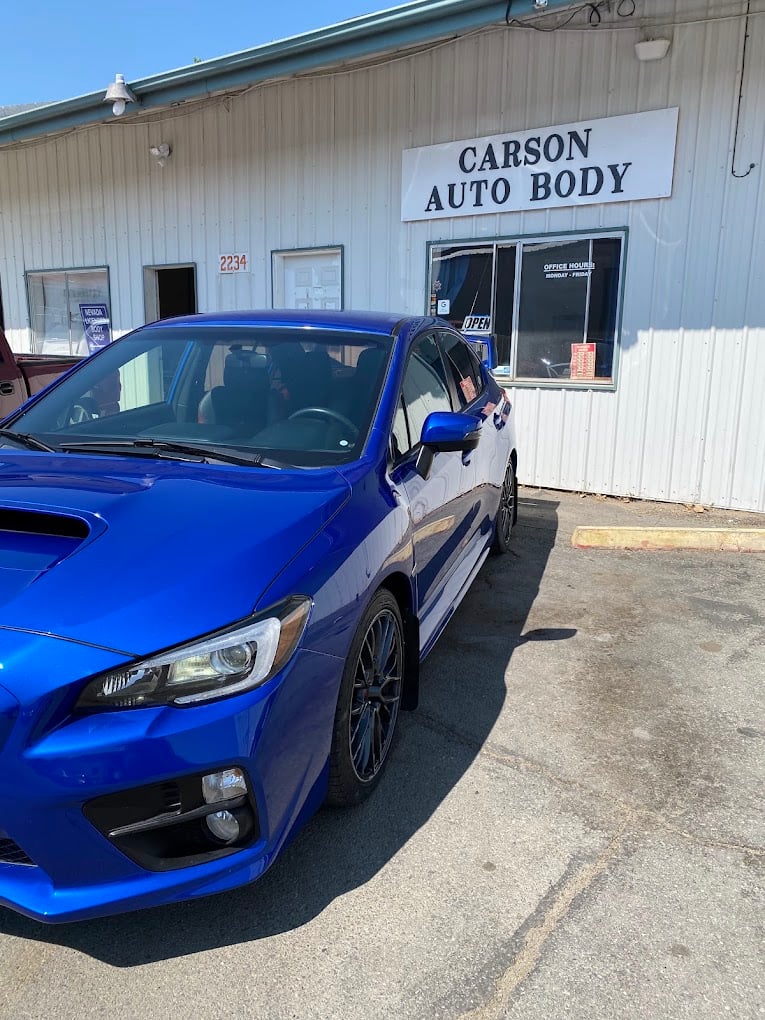 Blue Car In Front Of Shop at Carson Auto Body