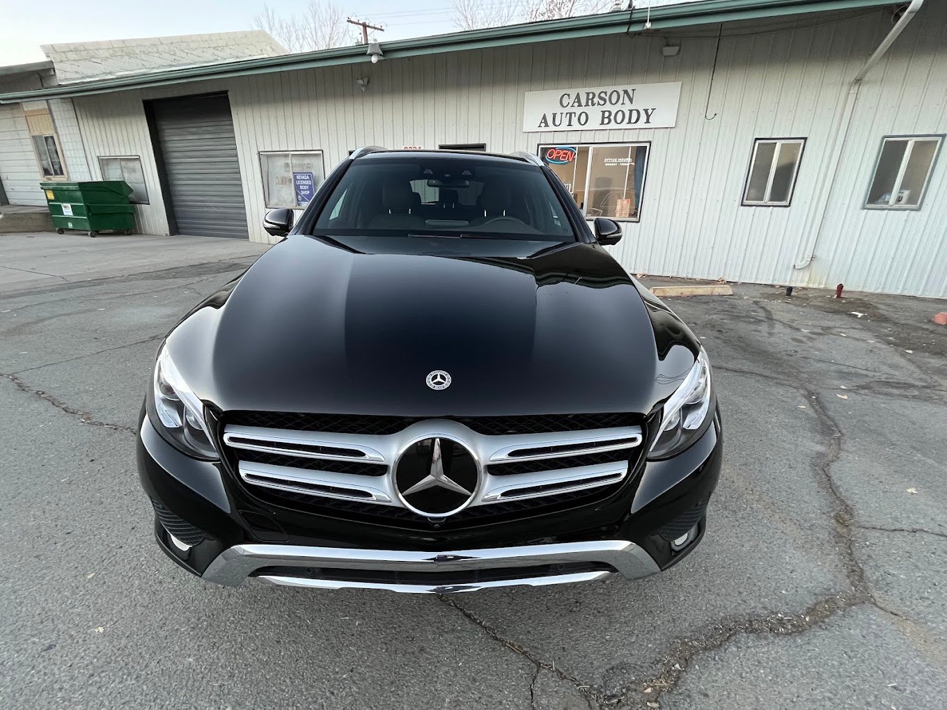 Clean New Mercedez In Front Of Shop at Carson Auto Body
