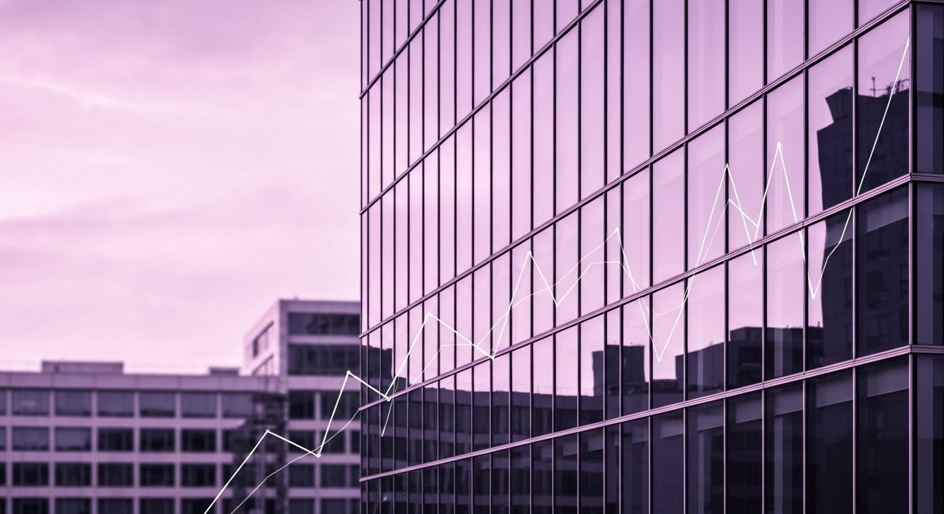 Glass building with abstract purple graphs and a blurred cityscape in the background
