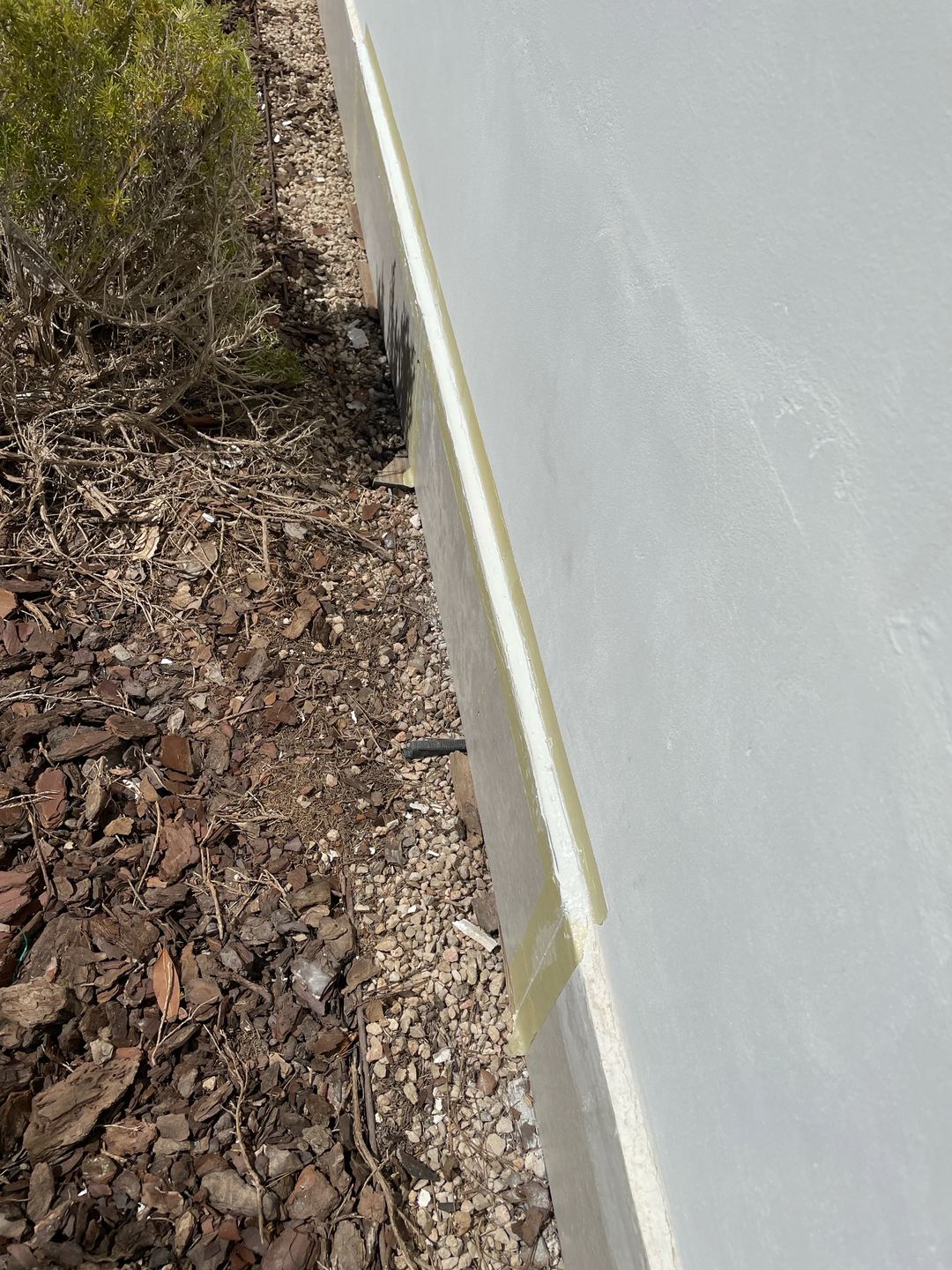 Wall base painted, masking tape applied