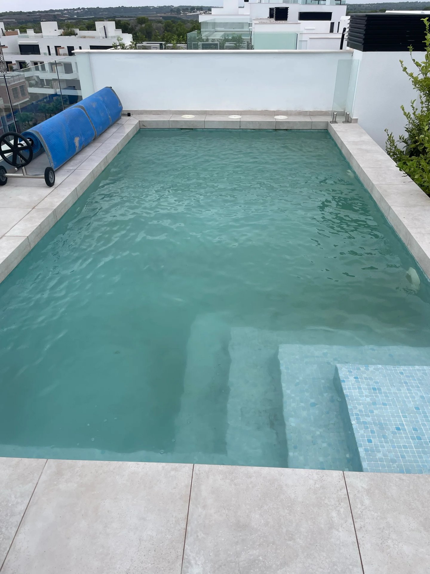 Pool water cloudy, floor dirty with sediment