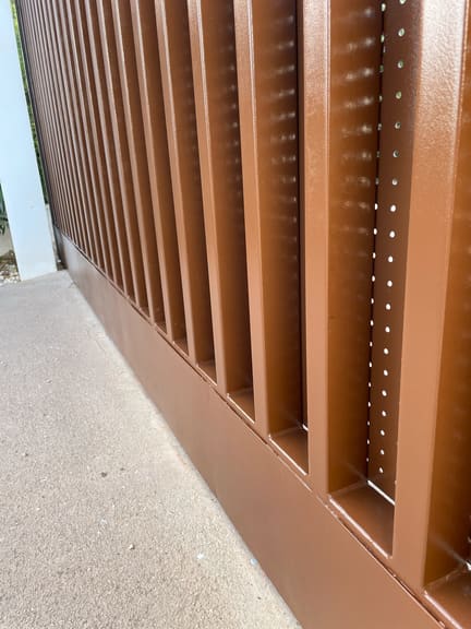 Gate bottom painted, rust removed