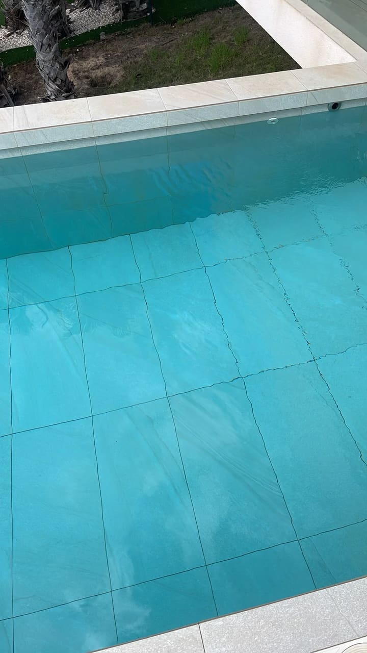 After: Pool floor cleaned, water crystal clear