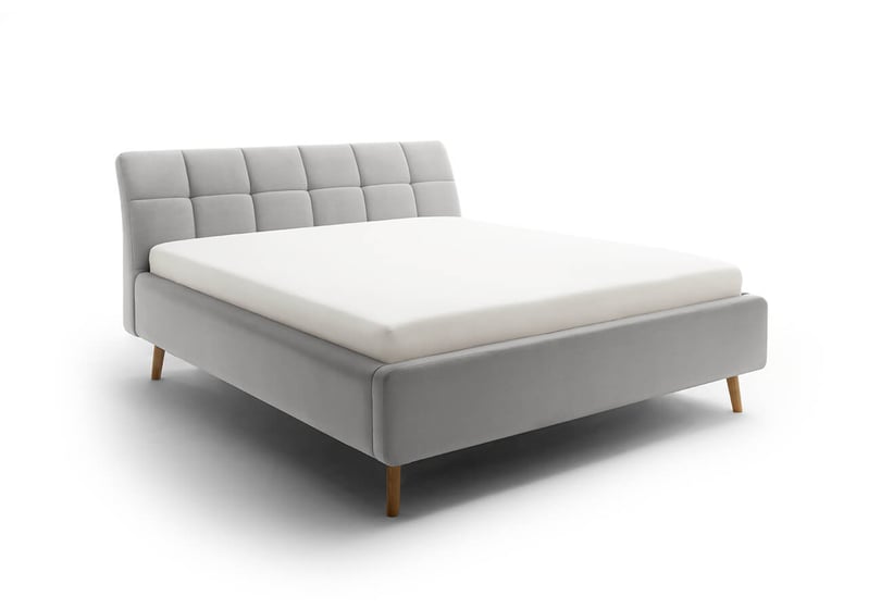 Čalouněná postel s prošívaným čelem lemina s úložným prostorem 180 x 200 cm světle šedá