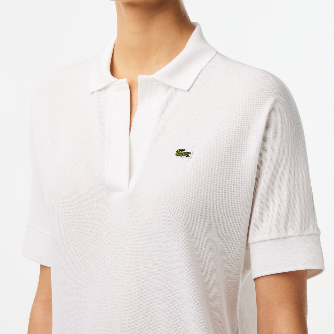 Polo femme Lacoste seconde main photo 3