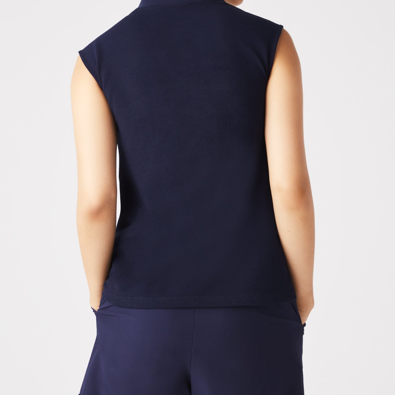 Polo femme Lacoste seconde main photo 4
