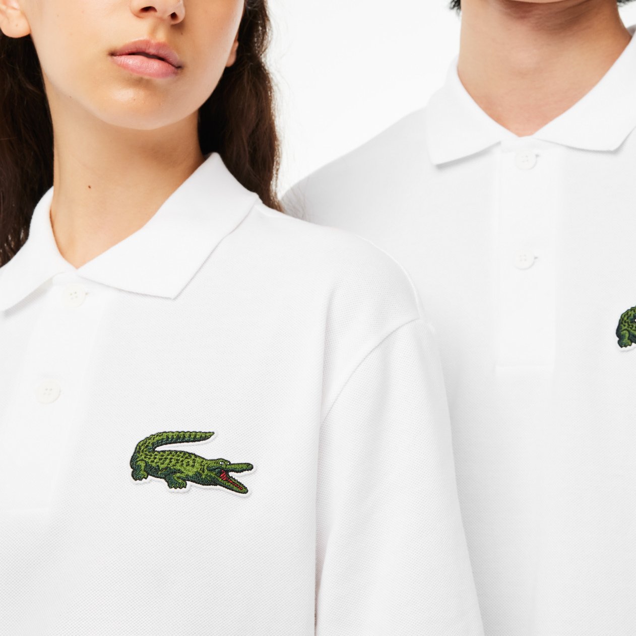 Polo unisexe Lacoste seconde main photo 4