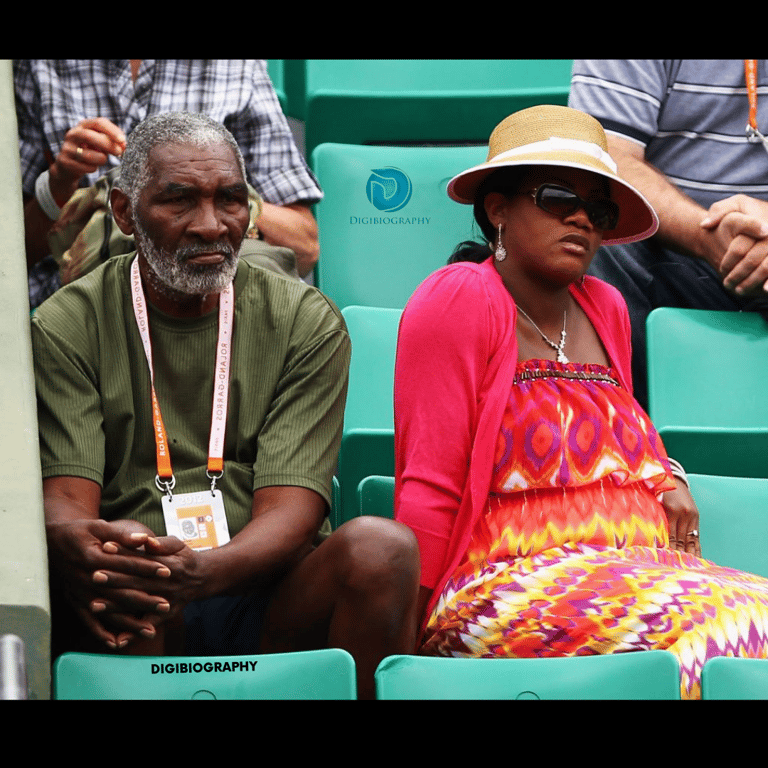 Richard Williams sitting with her wife Oracene Price