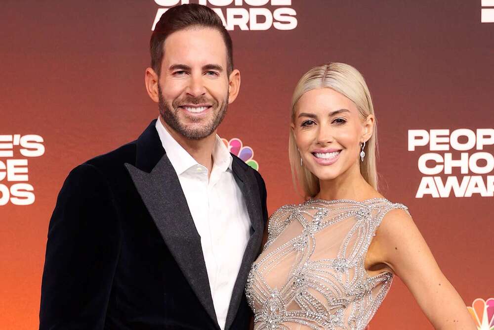 Tarek El Moussa standing with new wife Heather Rae Young