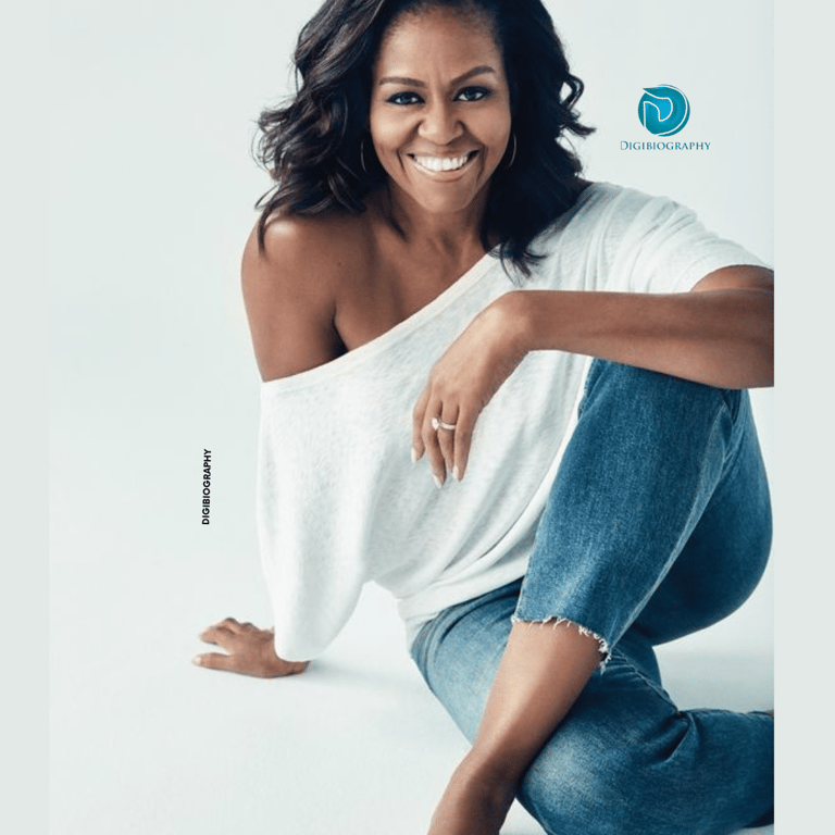Michelle Obama wearing a blue and white dress while sitting on the floor