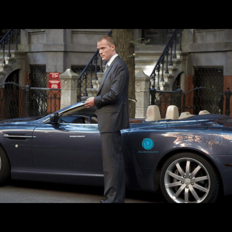 Paul Bettany stands in front of her car and wearing a black coat