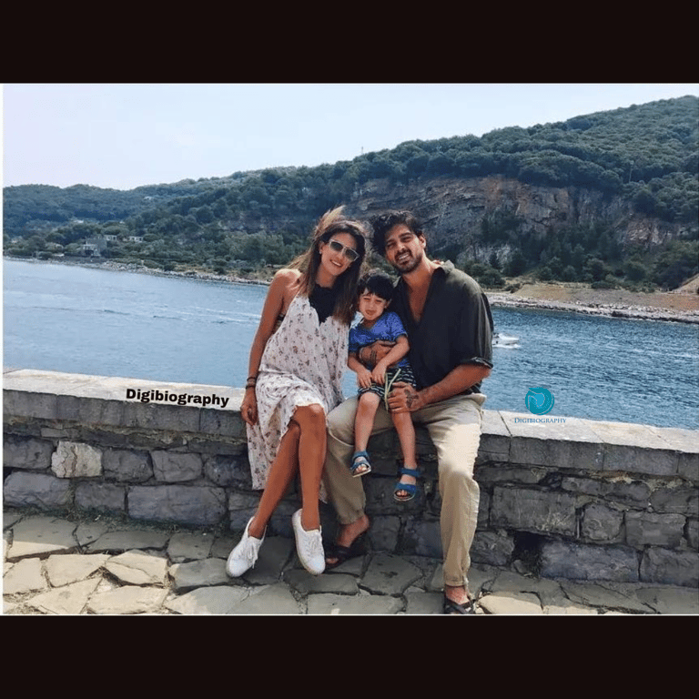 Rouba Saadehs sitting with the husband and son at the rock on the hill station