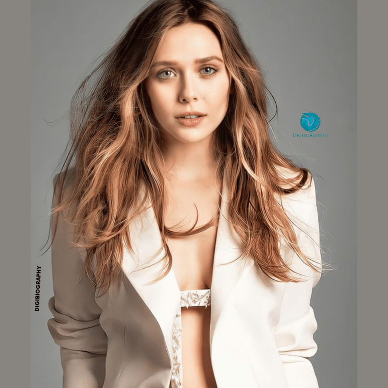 Elizabeth Olsen wearing a white coat and stand in the photo studio