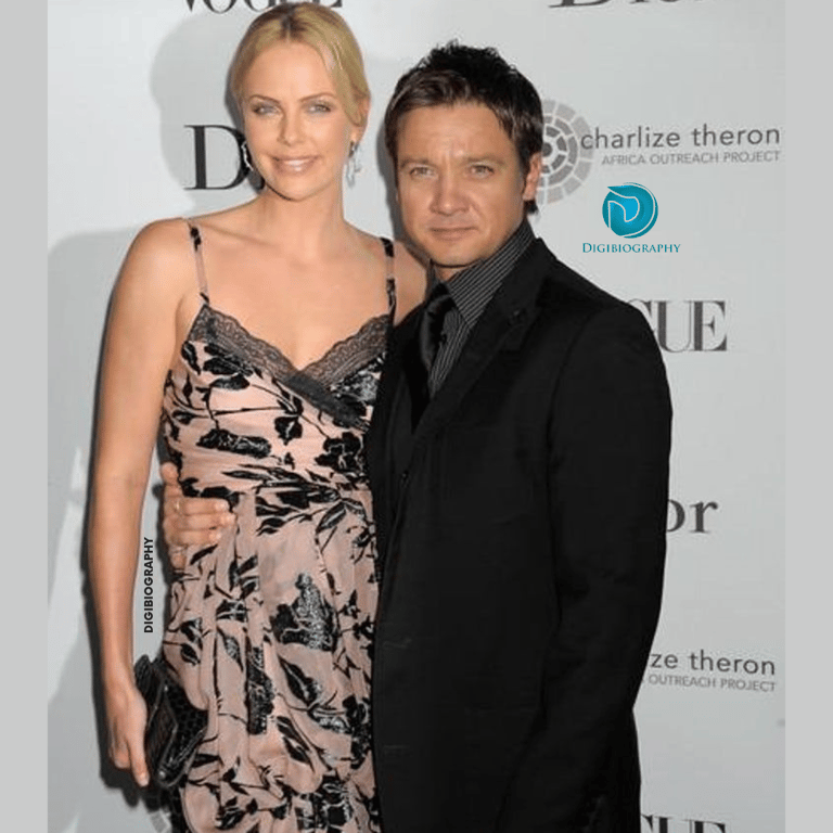 Charlize Theron stands with her ex-boyfriend Jeremy Renner