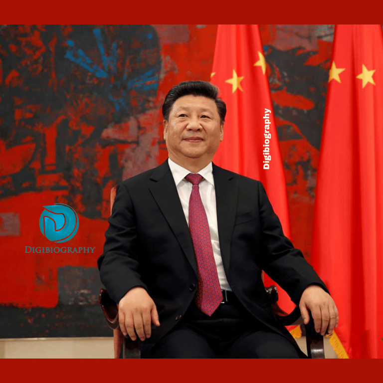 Xi Jinping sitting in a chair while wearing a black suit