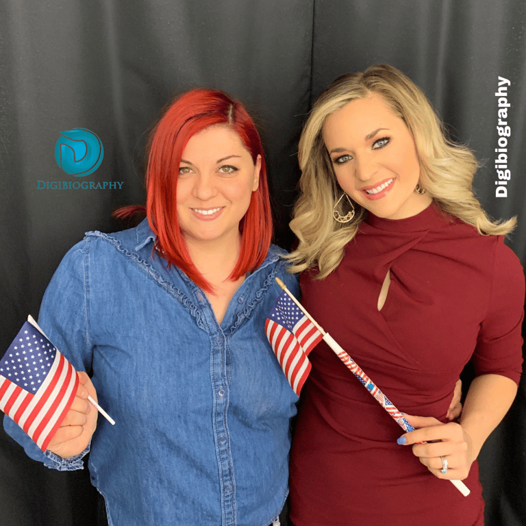 Jessica Tarlov stands with her friend holding the American flag in his hand