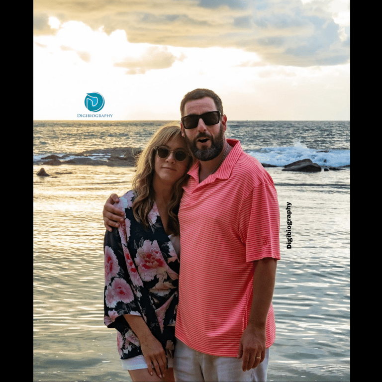 Adam Sandler hugged their wife on the beach, standing nearby the beach