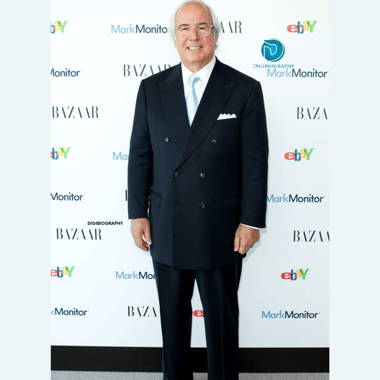 Frank Abagnale Jr wearing a black blazer and gives a look