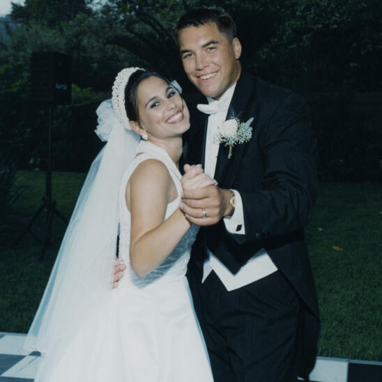 Laci Peterson's marriage photo where they wear a marriage dress