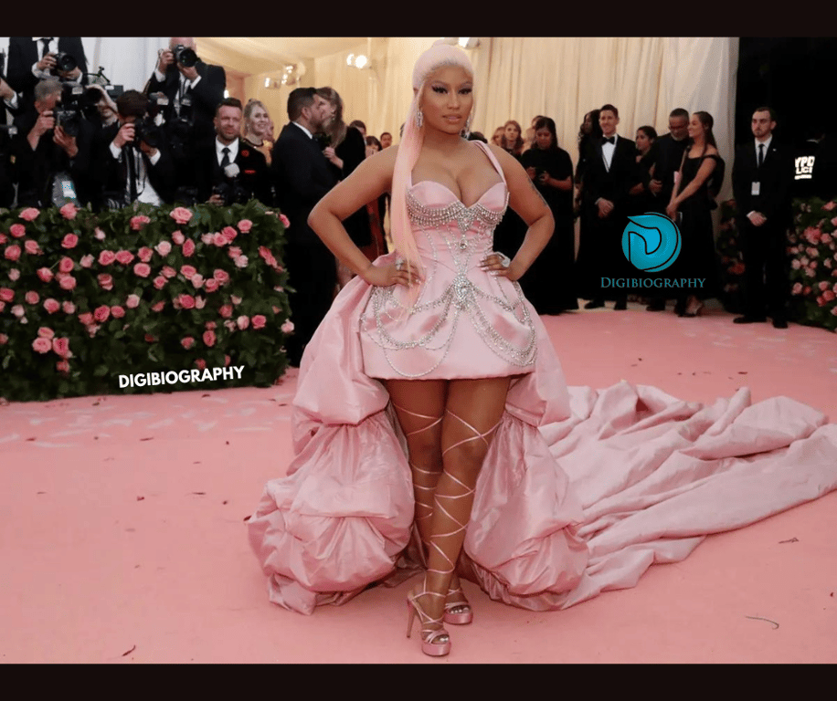 Nicki Minaj attends a met gala faction and wears a pink dress