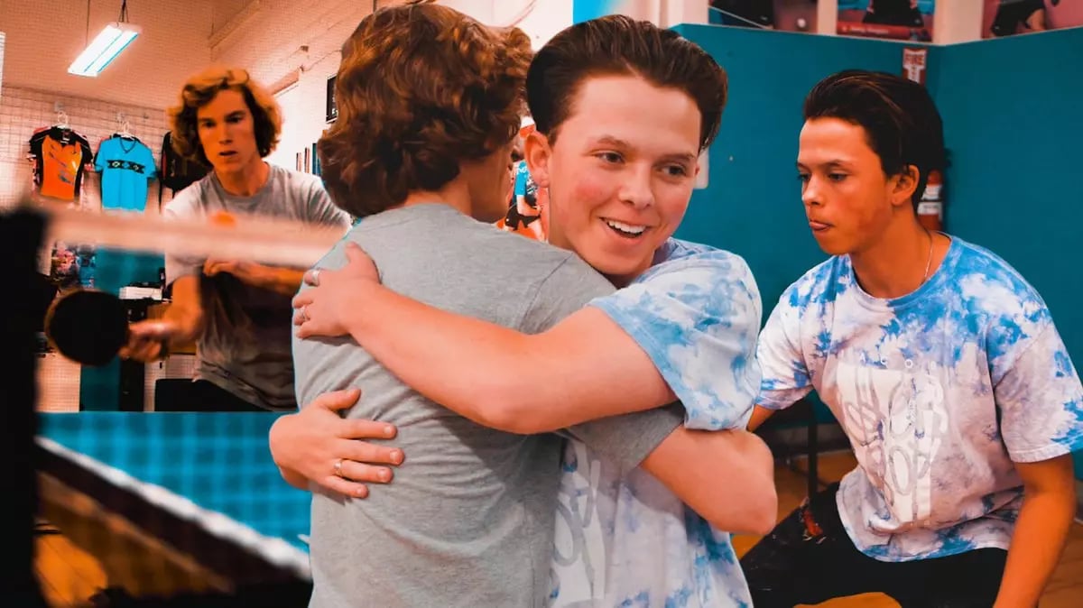 Jacob Sartorius giving hug to a friend nearby TT game