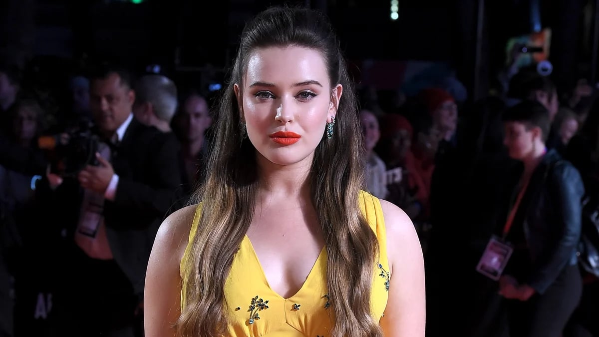 Katherine Langford wears a yellow dress in the function