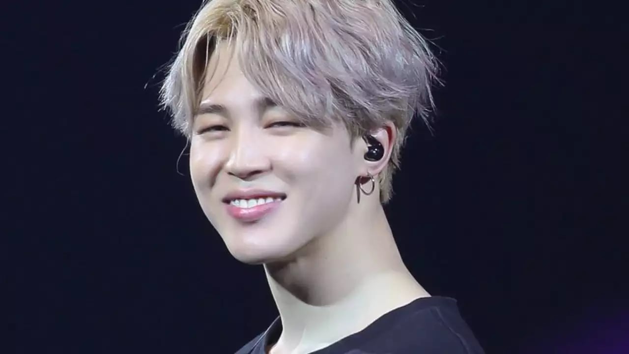 Park Jimin making cute face while performing on a stage