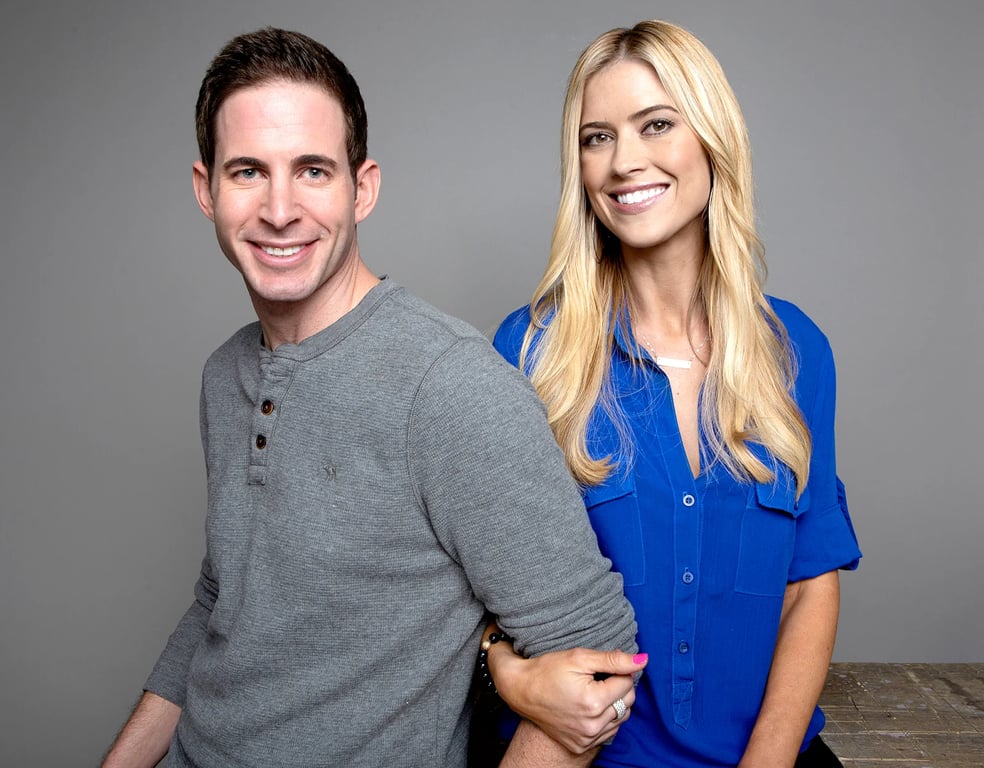 Tarek El Moussa and with new wife both are smiling