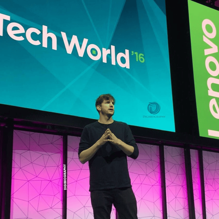 Ashton Kutcher stands on the stage and gives a speech about the technology