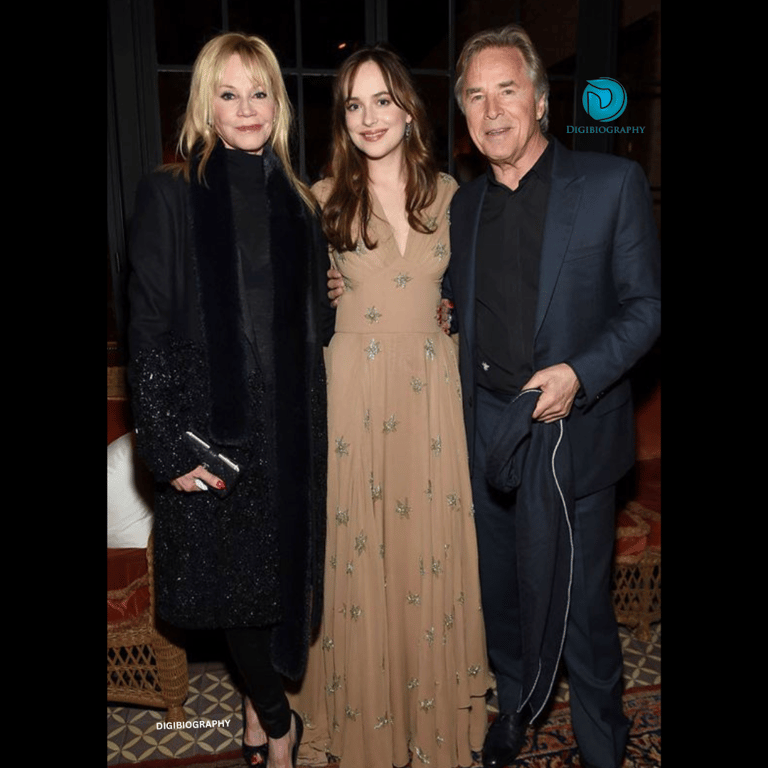 Dakota Johnson standing with her parents