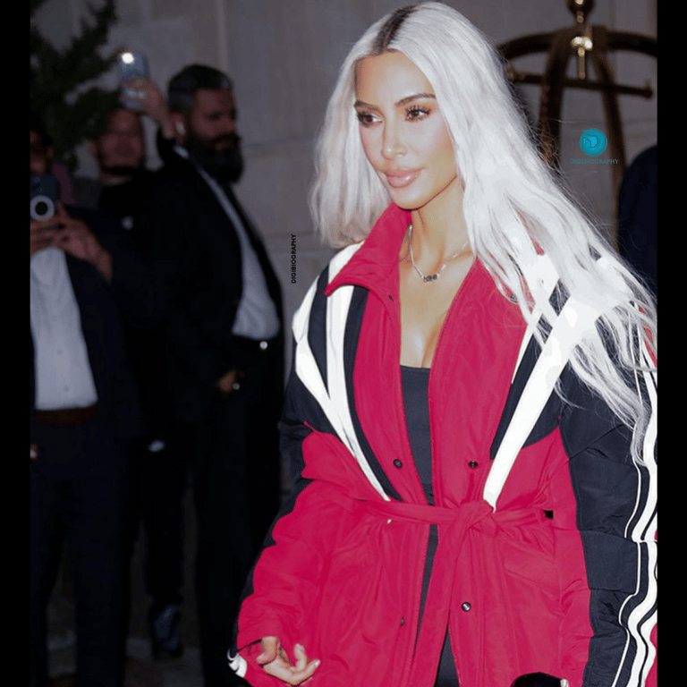 Kim Kardashian wearing a pink blazer and attended an award faction