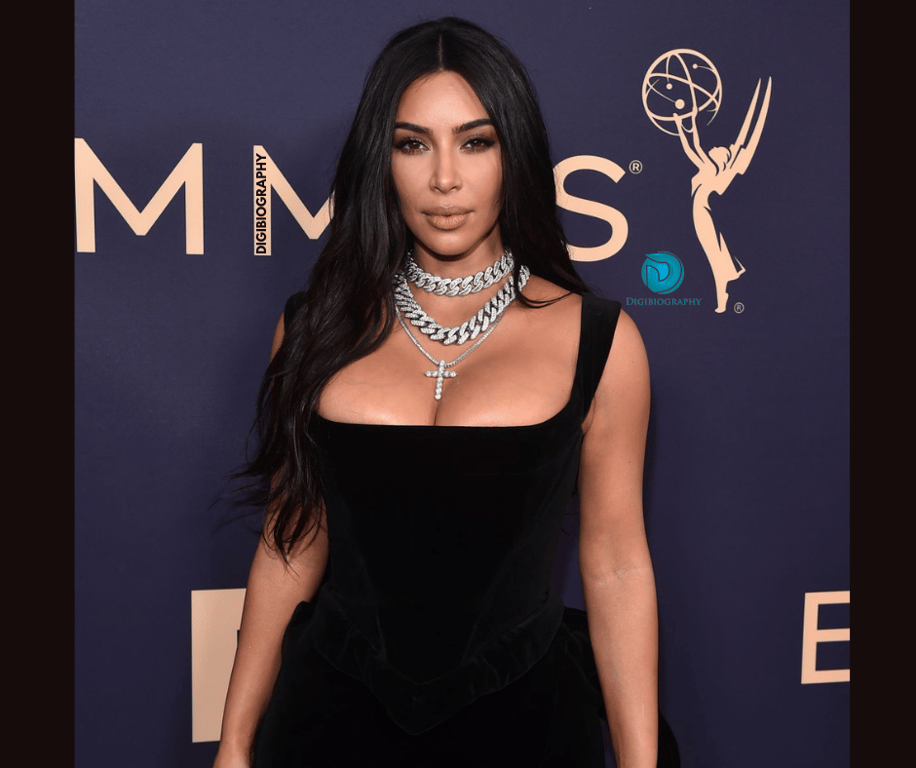 Kim Kardashian wearing a black dress and attending a Grammy award