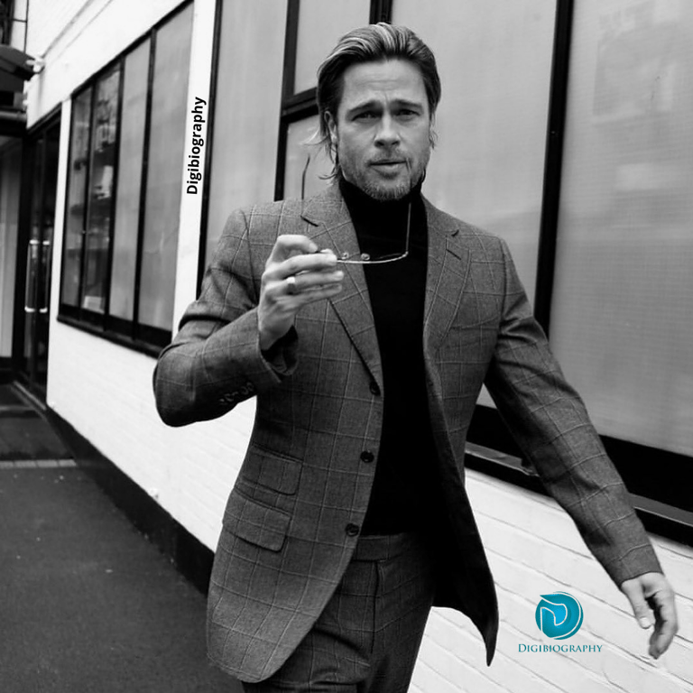 Brad Pitt wearing a suit and walking on the street 