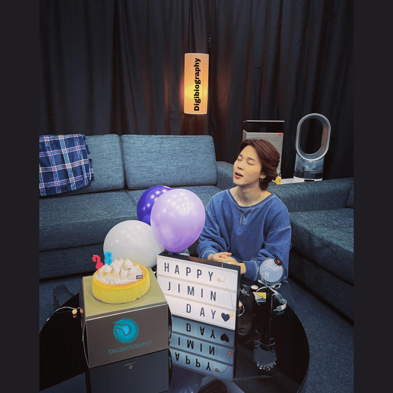 Park Jimin sitting in his house and celebrating his birthday alone with the balloon and cake