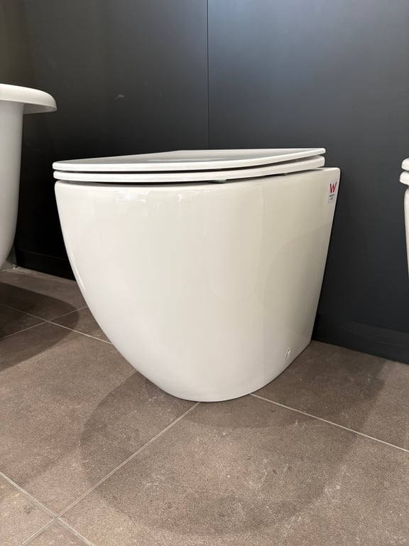 CaiTornado style floor mount pan with Soft Close Seat. image