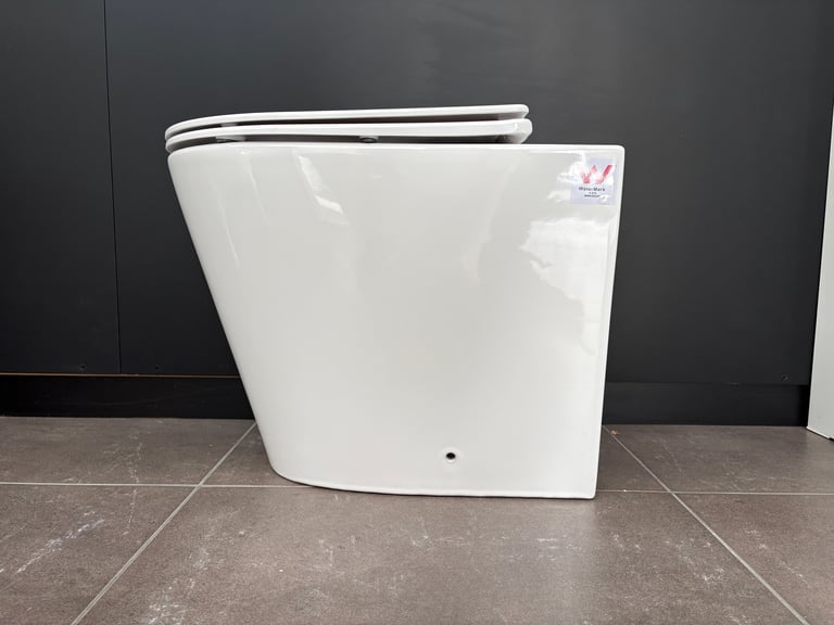 Faith Tornado style floor mount pan with Soft Close Seat. image
